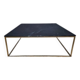 Table basse en marbre noir et laiton