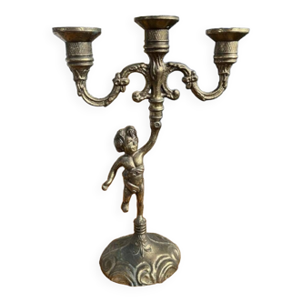 3-light golden candlestick, cherub decoration on base