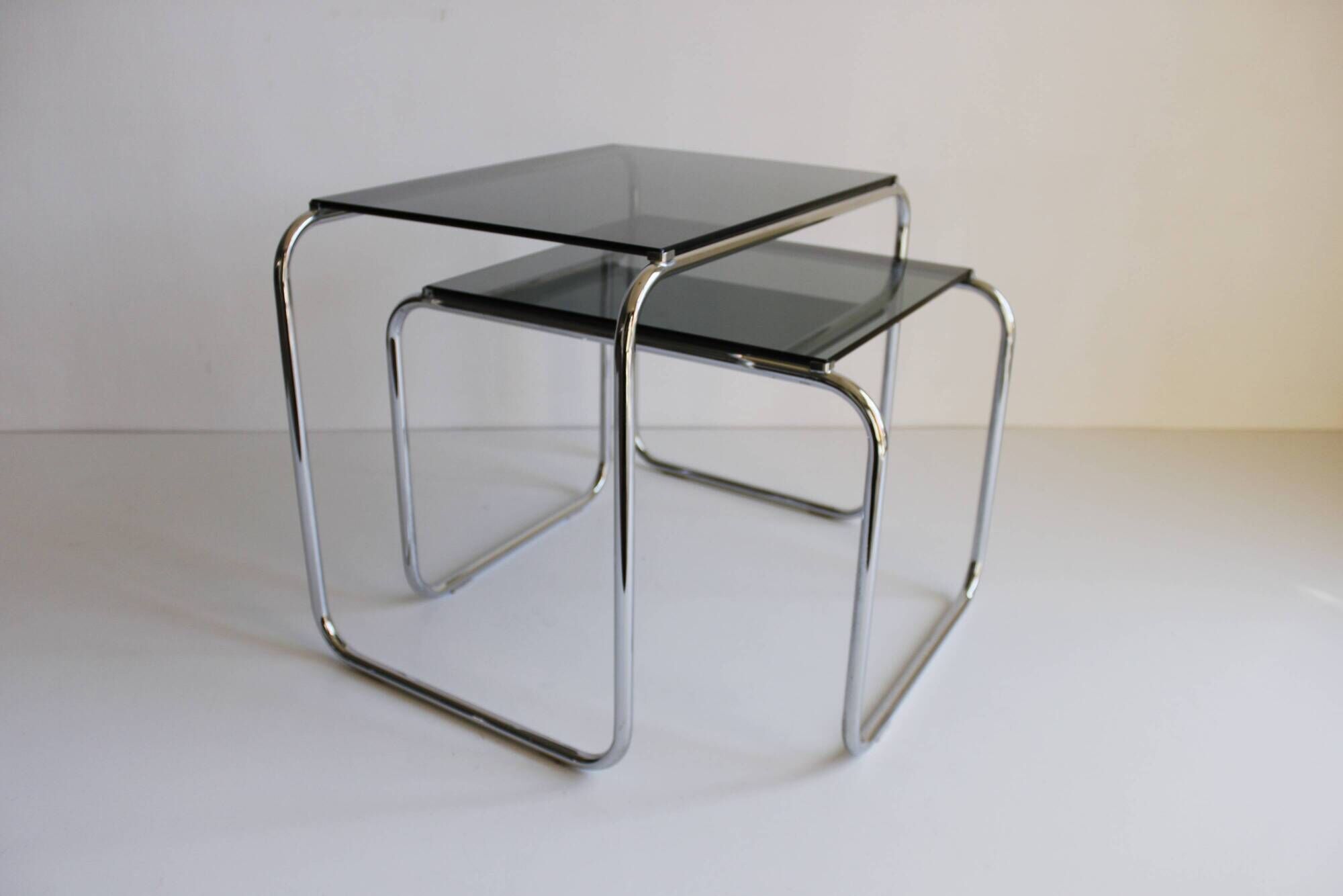 Tubular steel and smoked glass side tables, set of 2