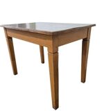 Vintage wooden table with a mint green top.