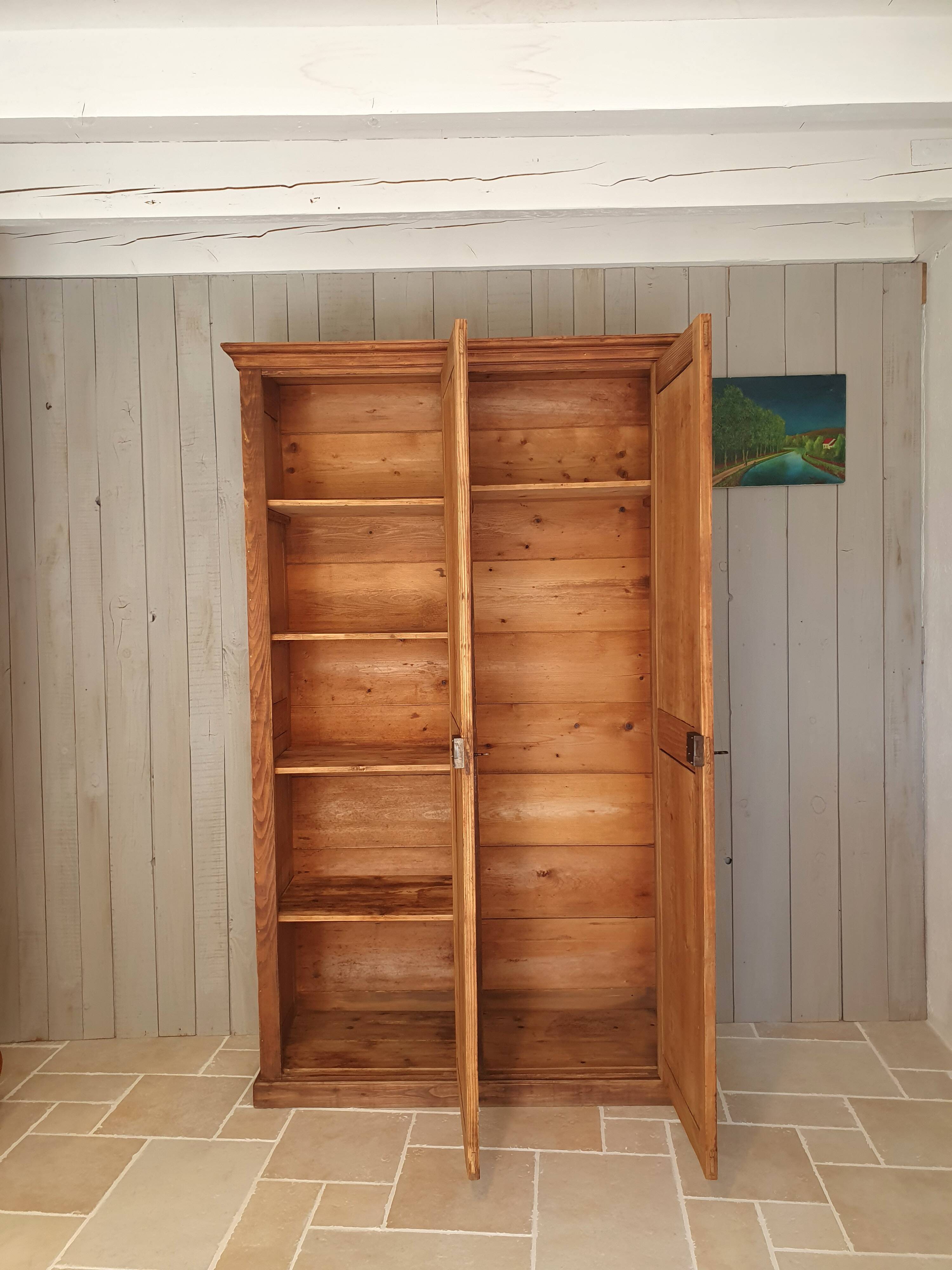Parisian wardrobe in raw wood