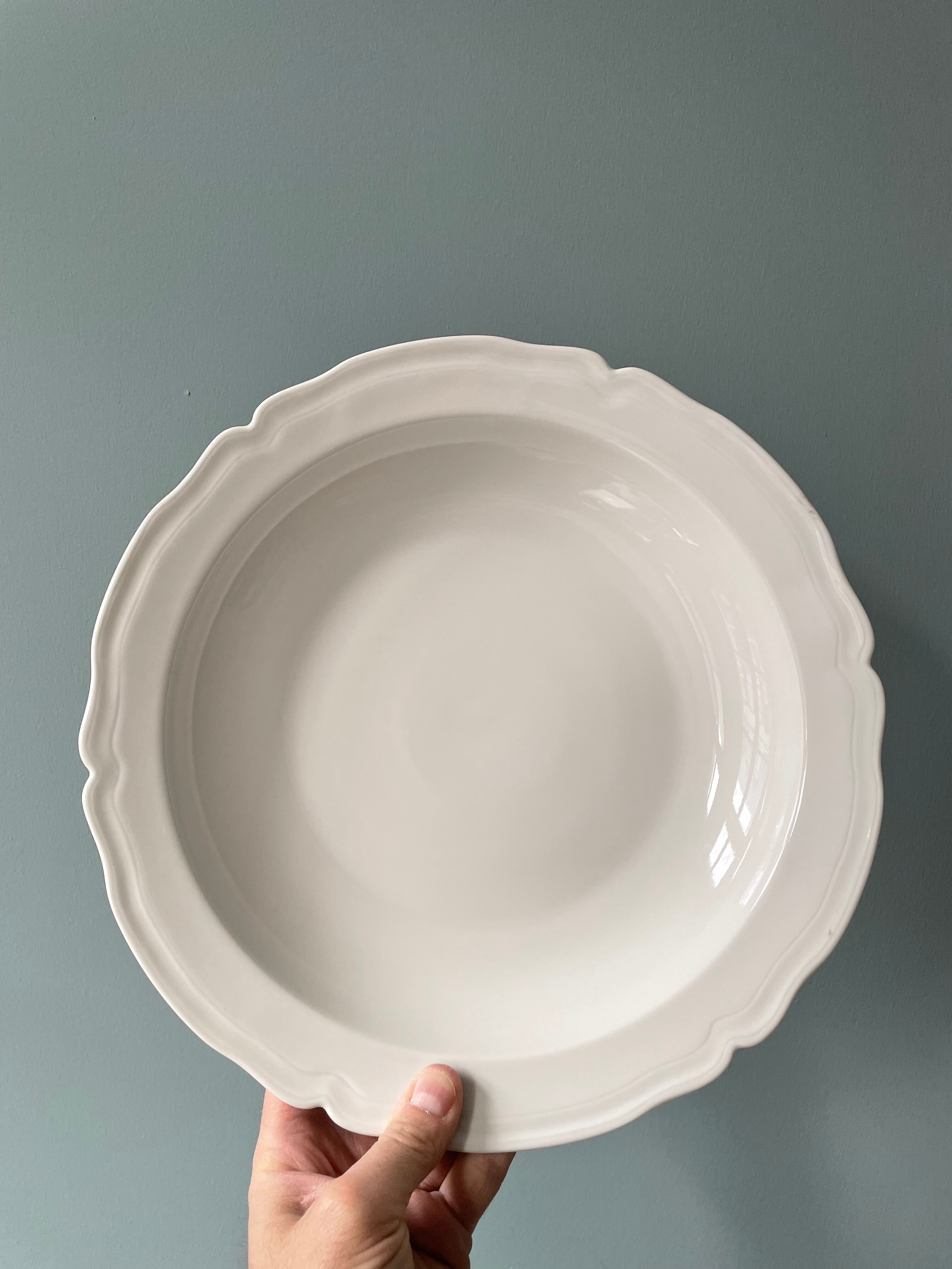 Old hollow round dish in Limoges porcelain