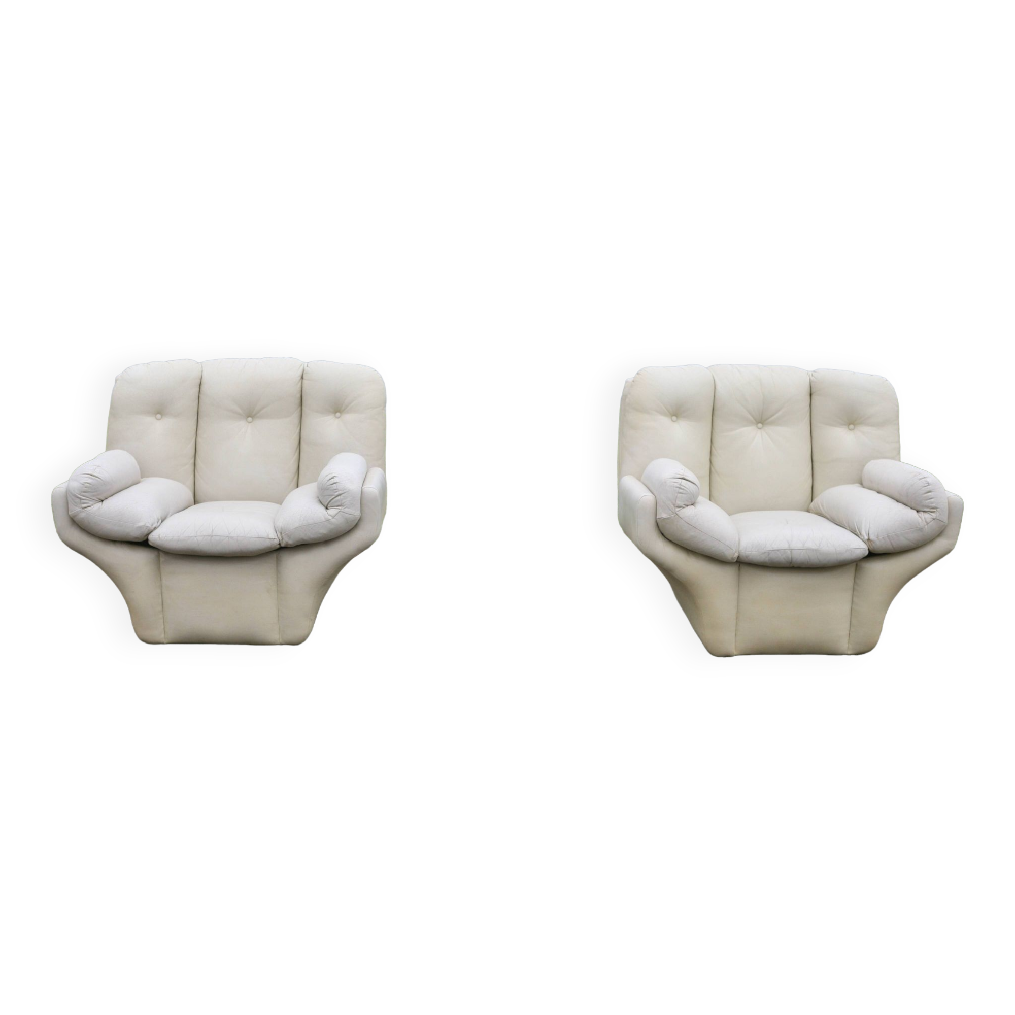 Pair of leather “space age” armchairs. Cream colour". Circa 1970.