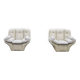 Pair of leather “space age” armchairs. Cream colour". Circa 1970.