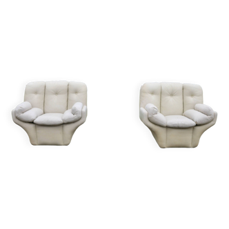 Pair of leather “space age” armchairs. Cream colour". Circa 1970.