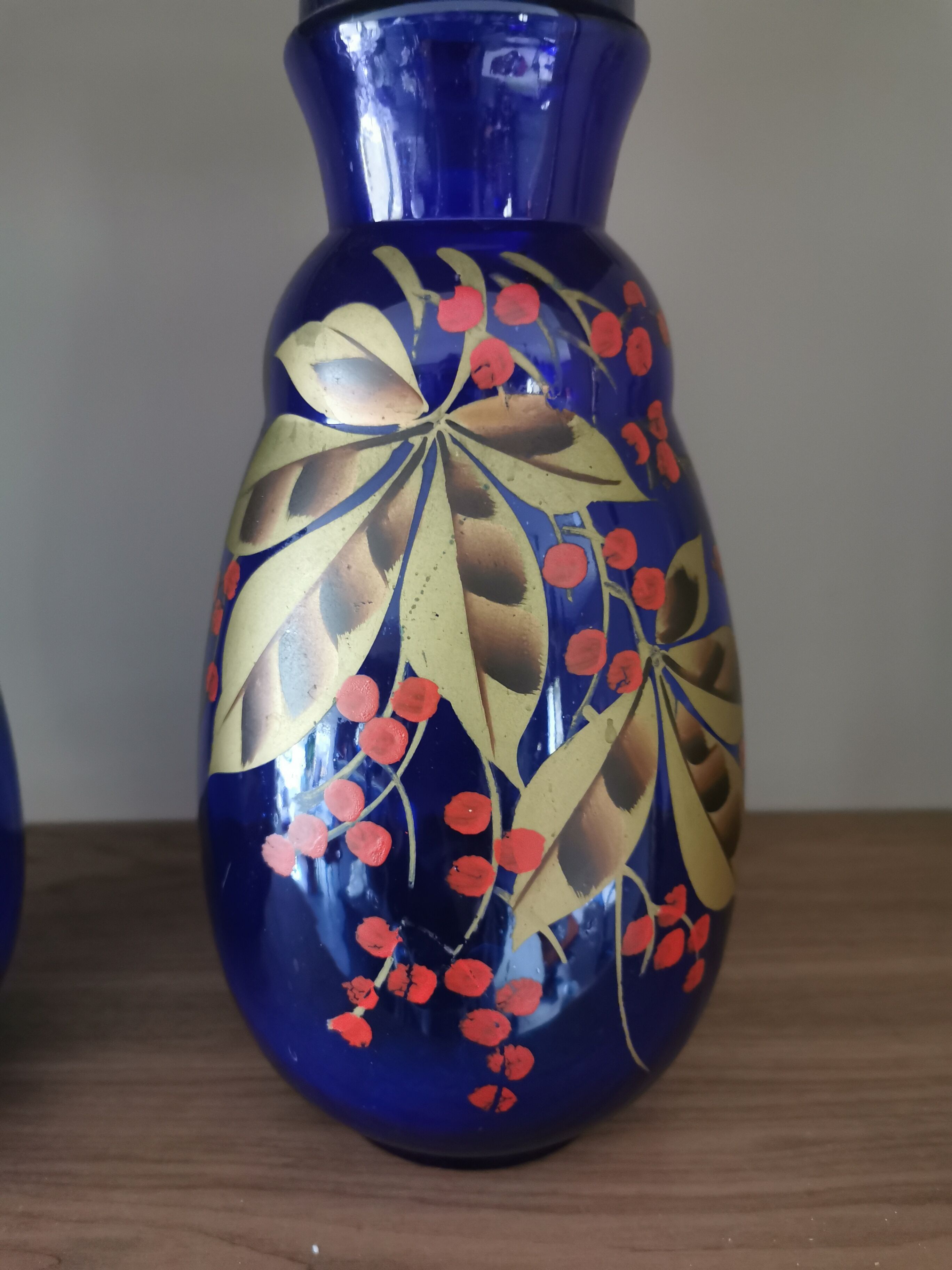 Pair of old blue painted glass vases