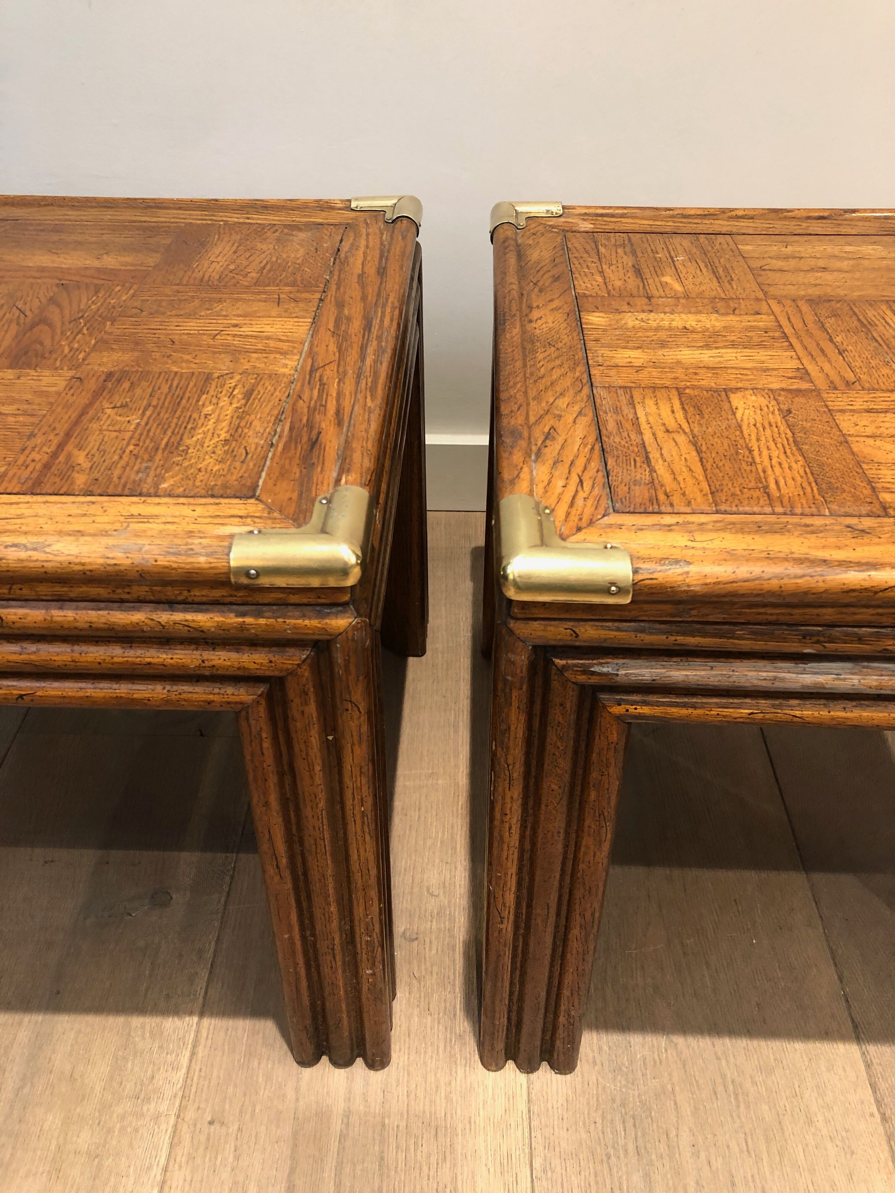 Pair of wooden and brass sofa ends