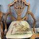 Set of four Sheraton-style armchairs. Solid walnut.