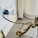 Floor lamp in gilded brass and round glass globe