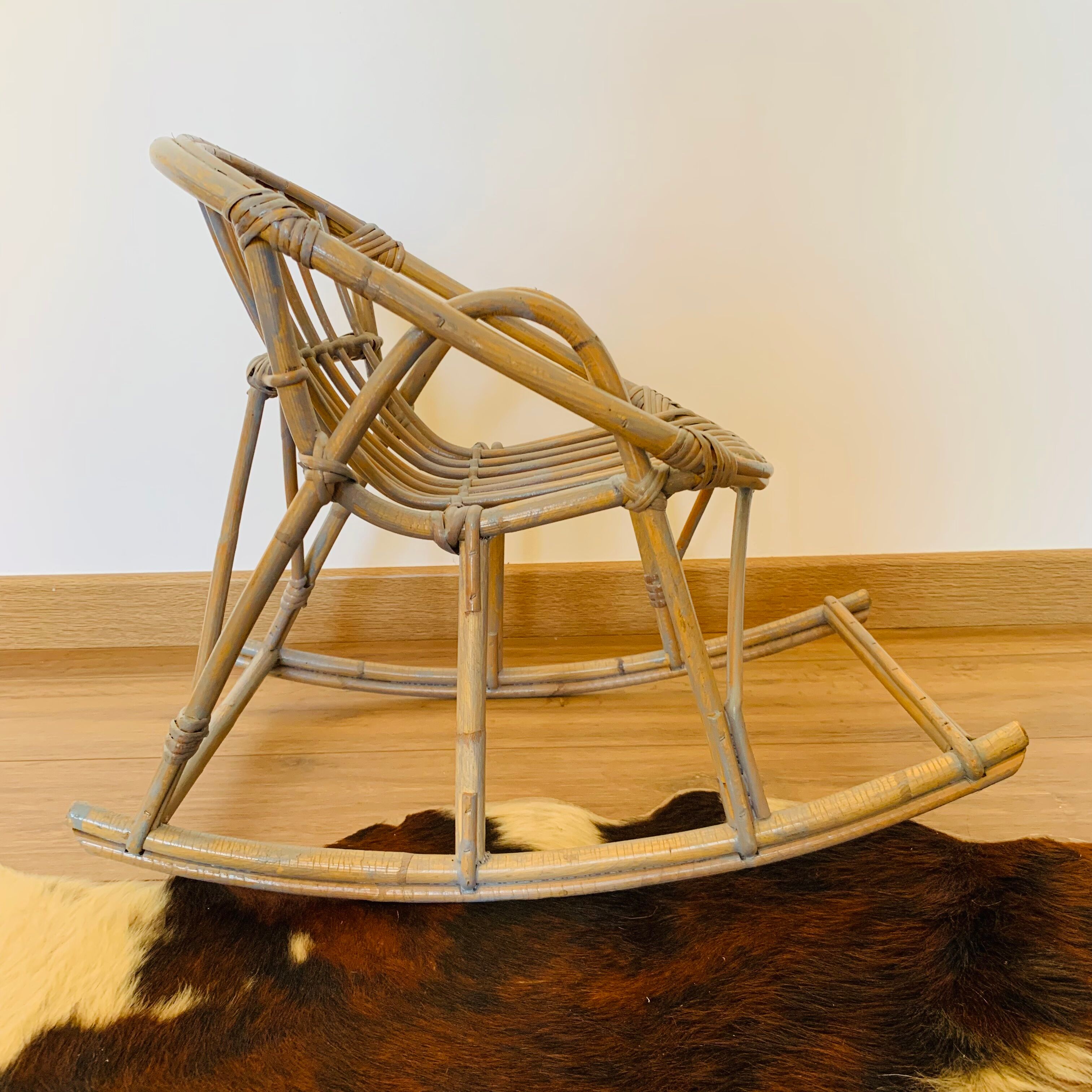 Child's wicker rocking chair, model.