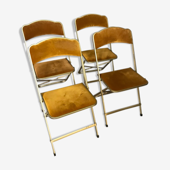 Quatre chaises pliantes velours et laiton
