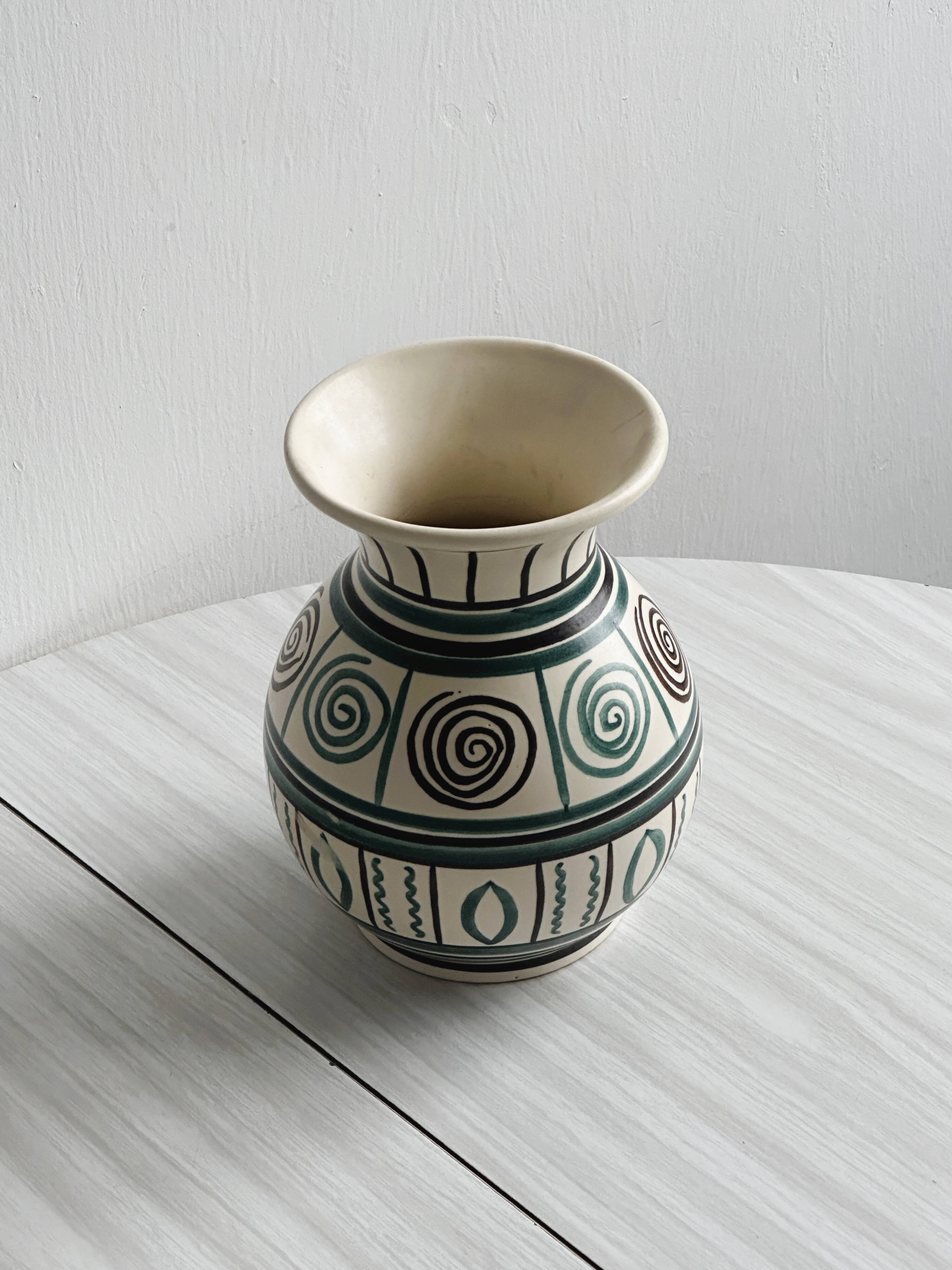Old handmade ceramic vase, Punter style geometric ornaments.
