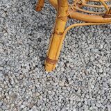 Round rattan coffee table with glass top from the 70s