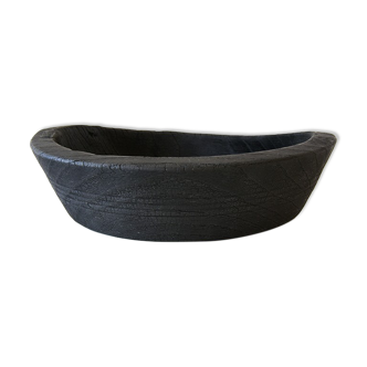 Cut / empty pocket in burning wood. shou-sugi-ban