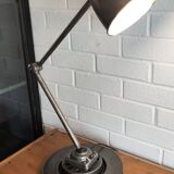 Old industrial two-arm workshop lamp