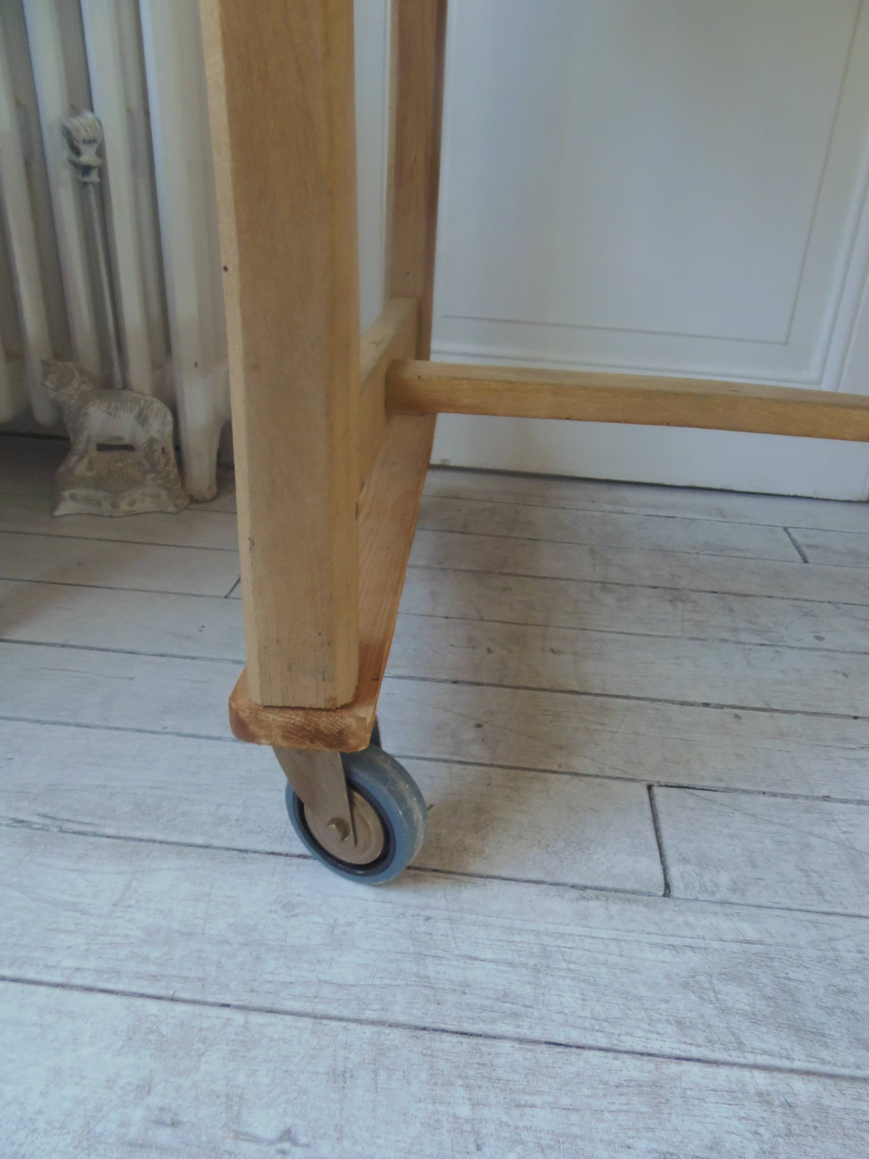Vintage kitchen table on casters.