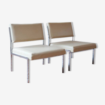 Pair of beige modernist easy chairs