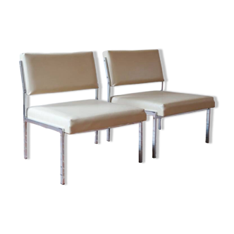 Pair of beige modernist easy chairs