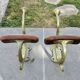 Pair of Art Nouveau coat hooks in bronze and chestnut, circa 1930.