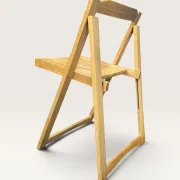 Blonde wooden folding chair in the style of Aldo Jacober.