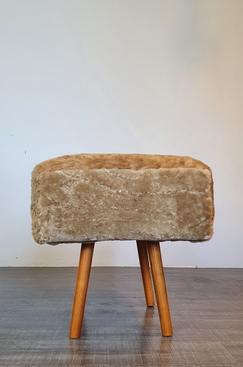 Norwegian sheepskin wing armchair with ottoman 1950