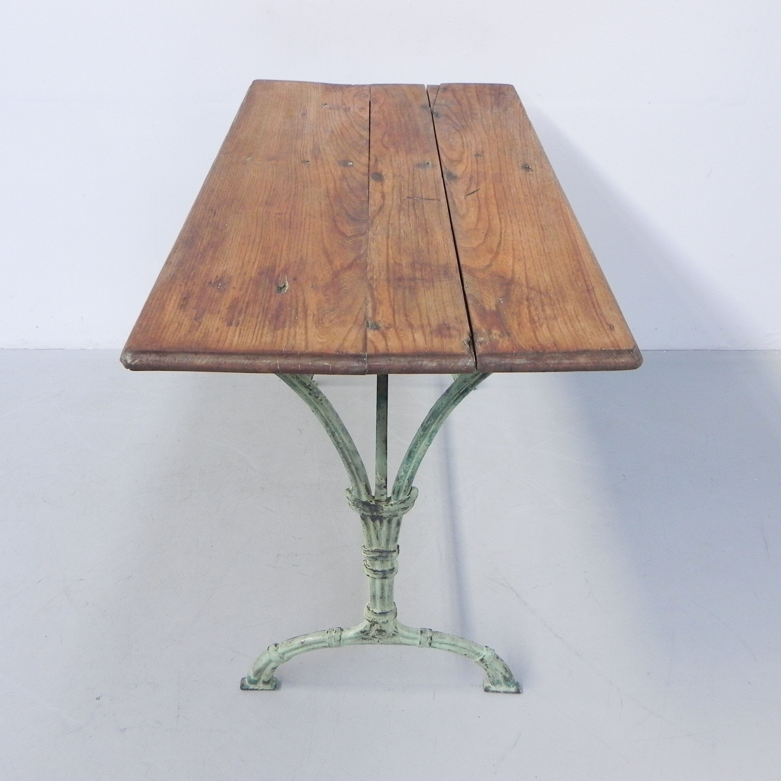 Art nouveau bistro table with cast iron frame