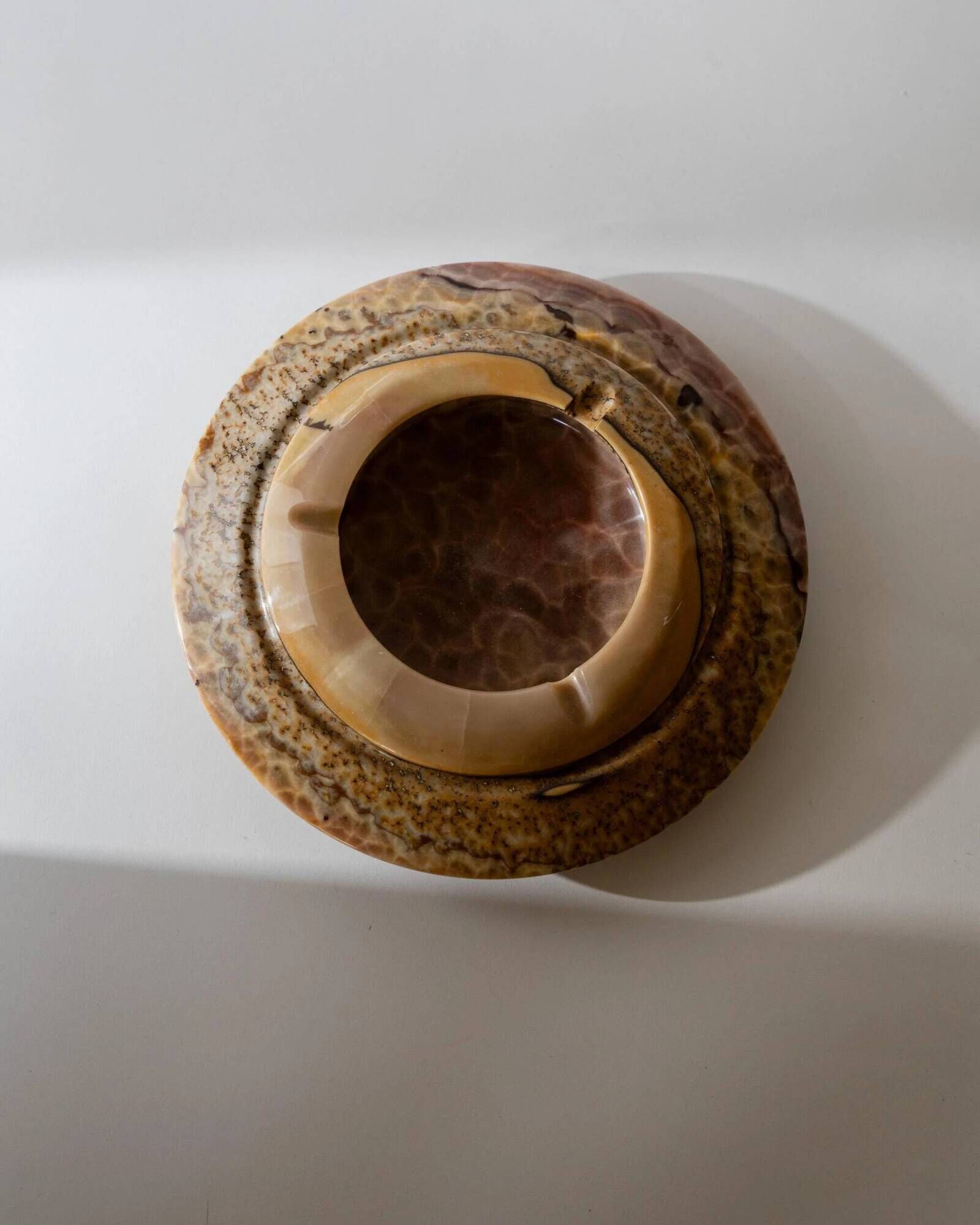 Vintage onyx ashtray from the 1980s, large round, brutalist design, brown and beige tones, sculptural table accent, modernist object, elegant gift idea.