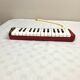 Vintage wind instrument Melodica Hohner piano 26