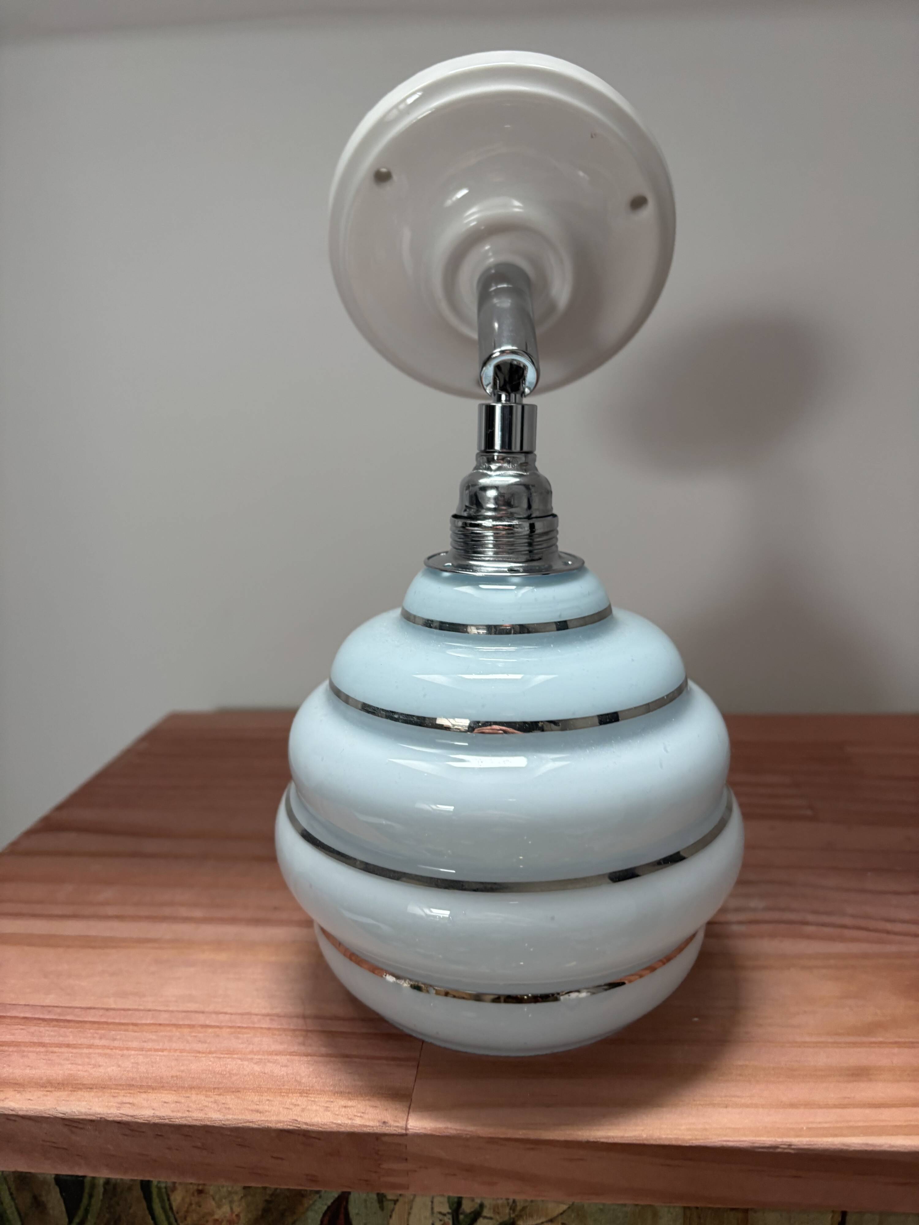 Blue and silver wall light