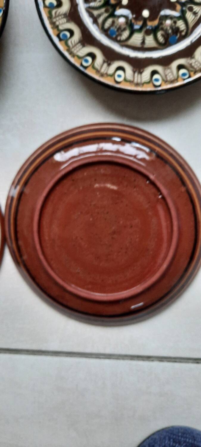 Hand painted pottery plates