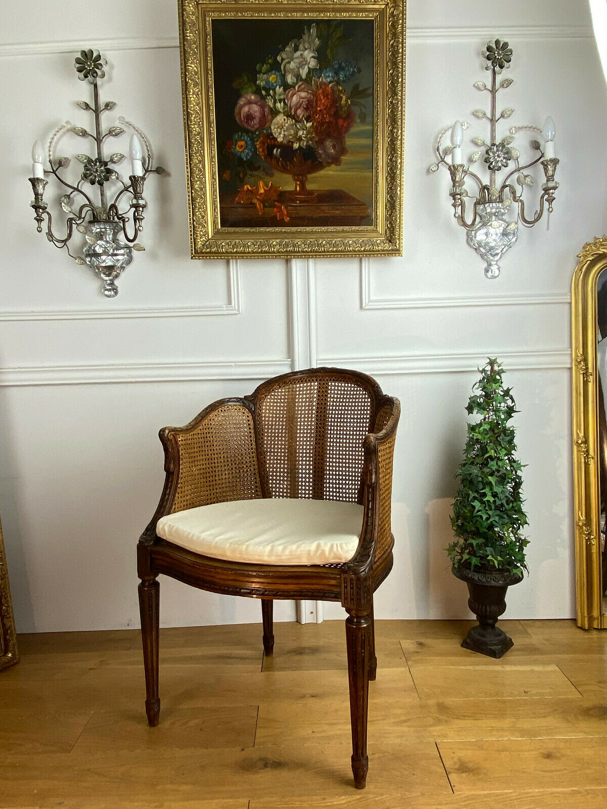 Old armchair with double cannage in walnut carved style Louis XVI of the nineteenth century