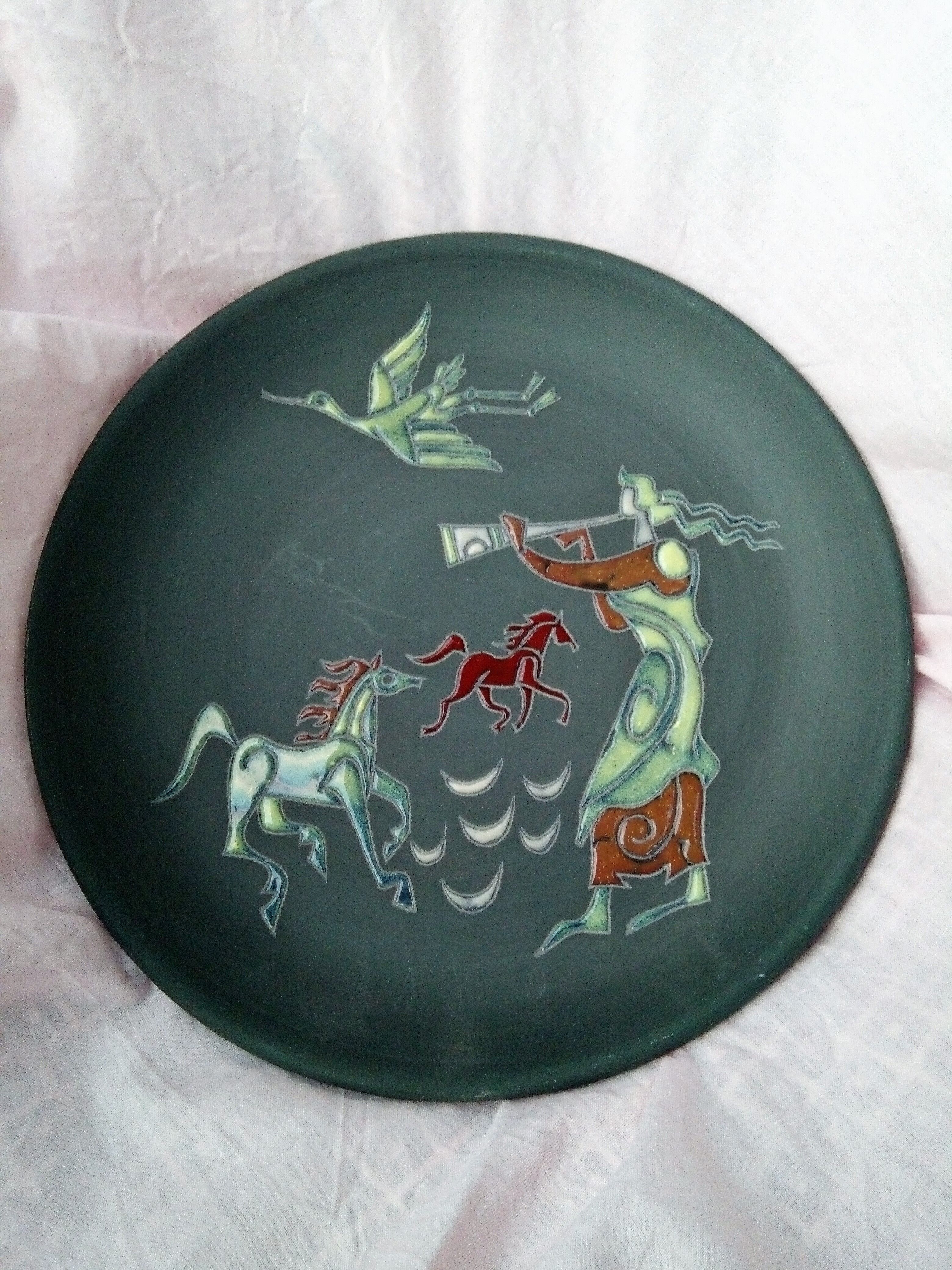 Rare pair of ceramic plates and enamel with mythological decoration. The 50s.
