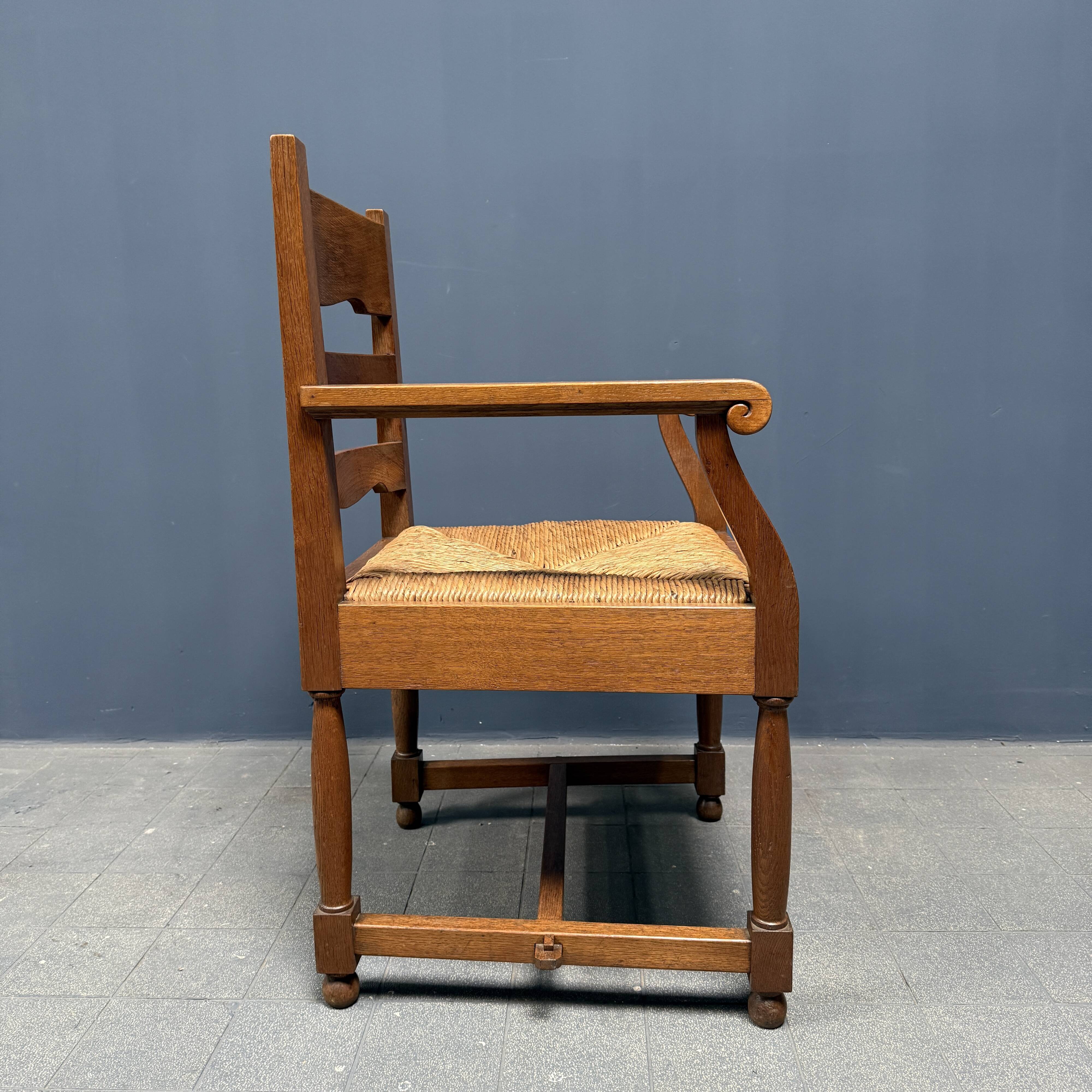 Set of two Dutch oak armchairs with rush seats