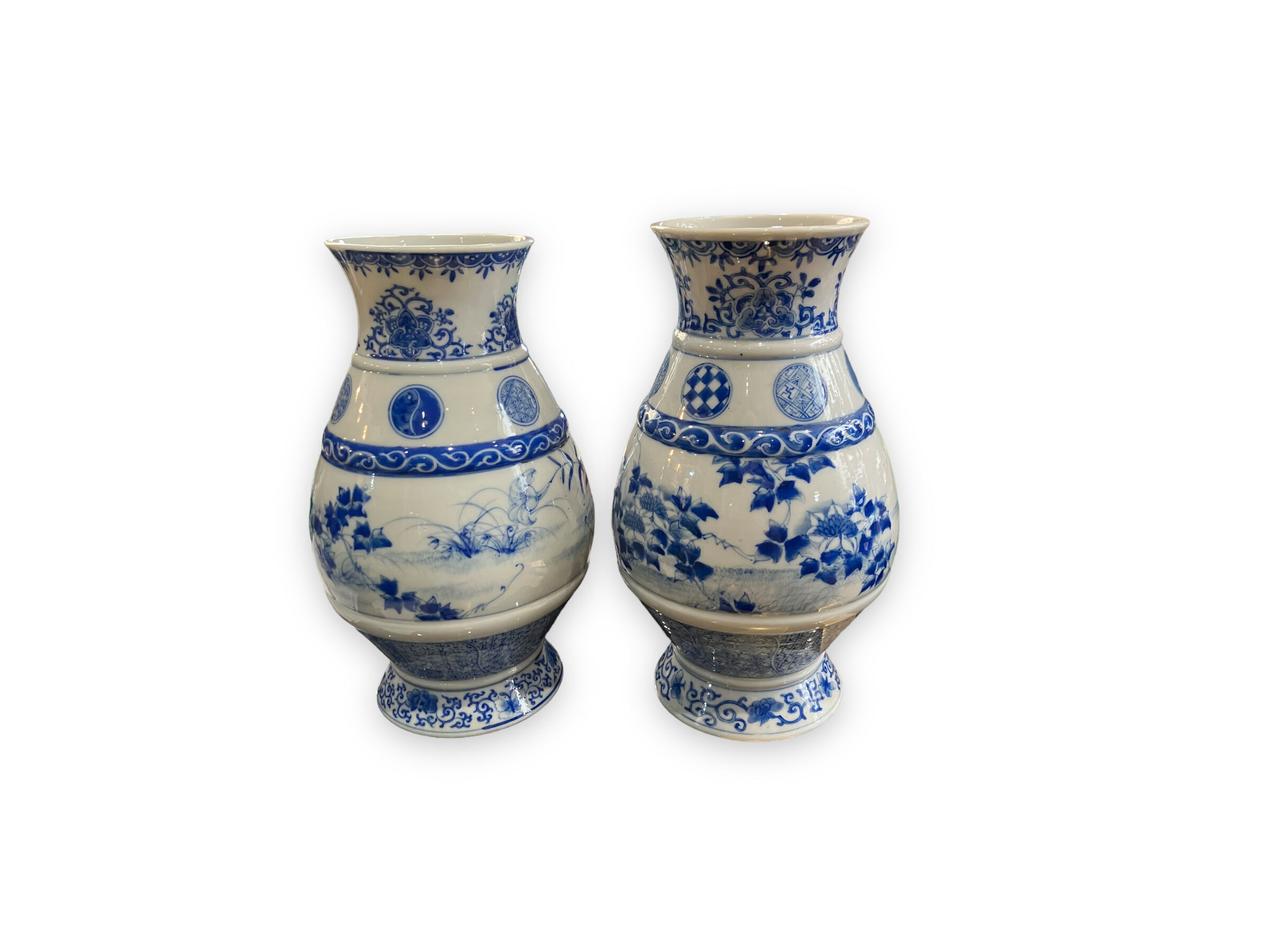 Pair of Asian vases in white and blue porcelain