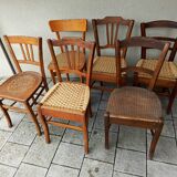 Set of 6 mismatched bistro chairs.