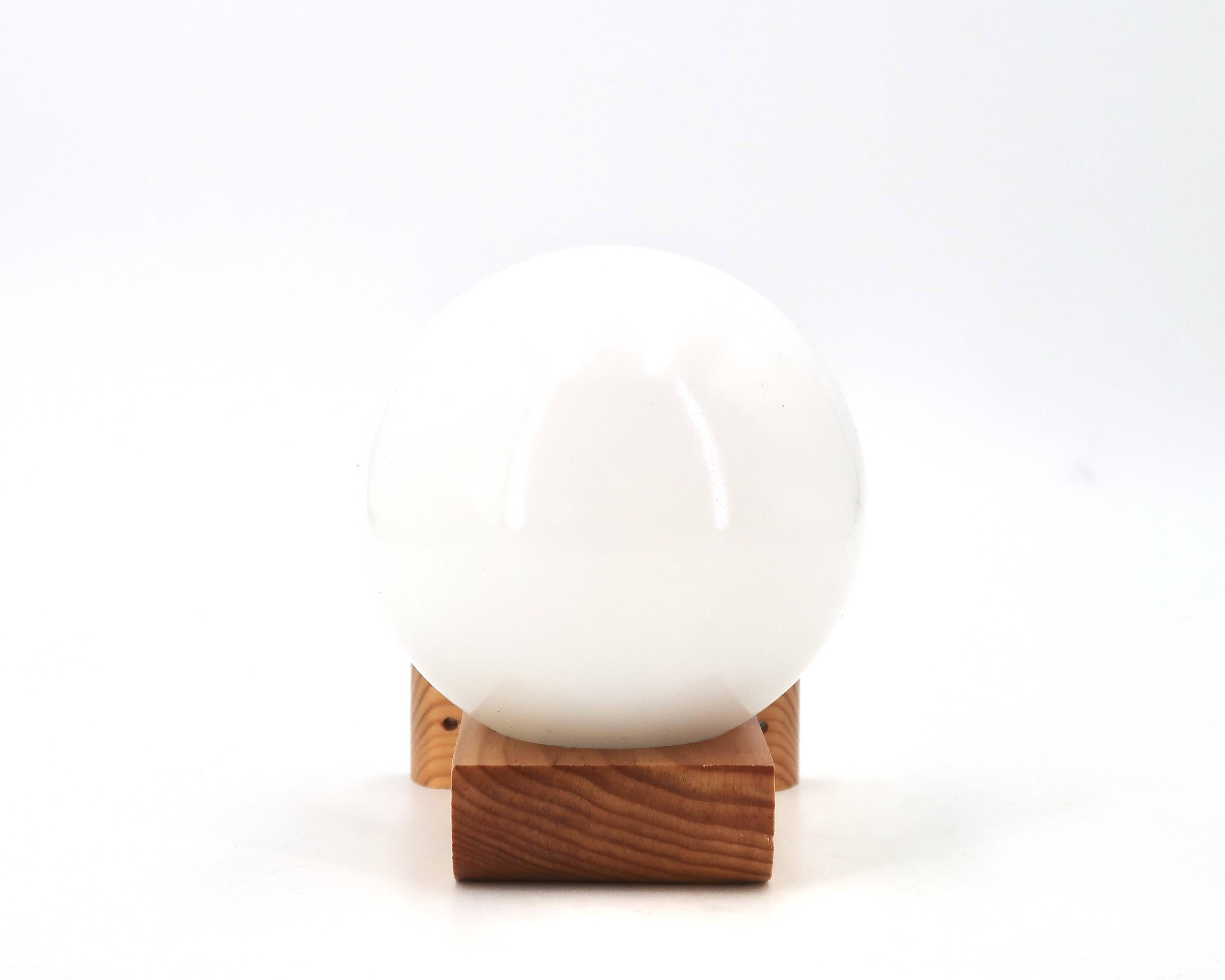 Wall light in pine wood with opaque white glass globe, 1980s