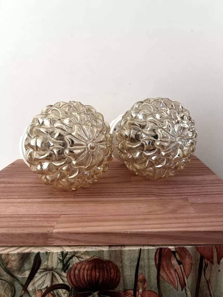 Pair of golden Scandinavian globe wall lights