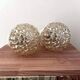 Pair of golden Scandinavian globe wall lights