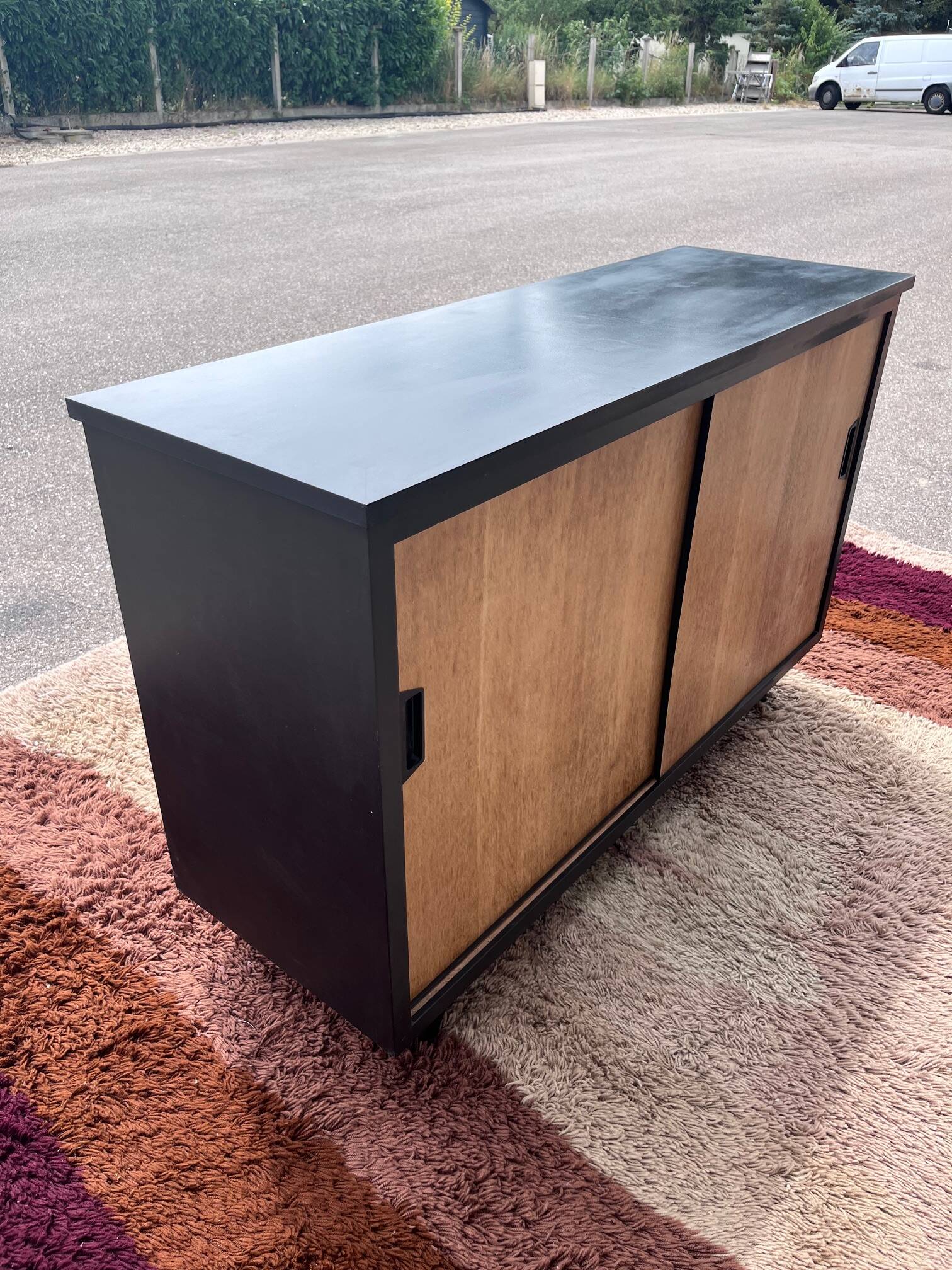 black and wood two-door sideboard