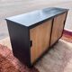 black and wood two-door sideboard