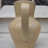 Beige ceramic pitcher