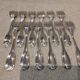 12 silver-plated metal cake forks by silversmith Cailar Bayard, shell design