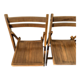 Three wooden folding chairs