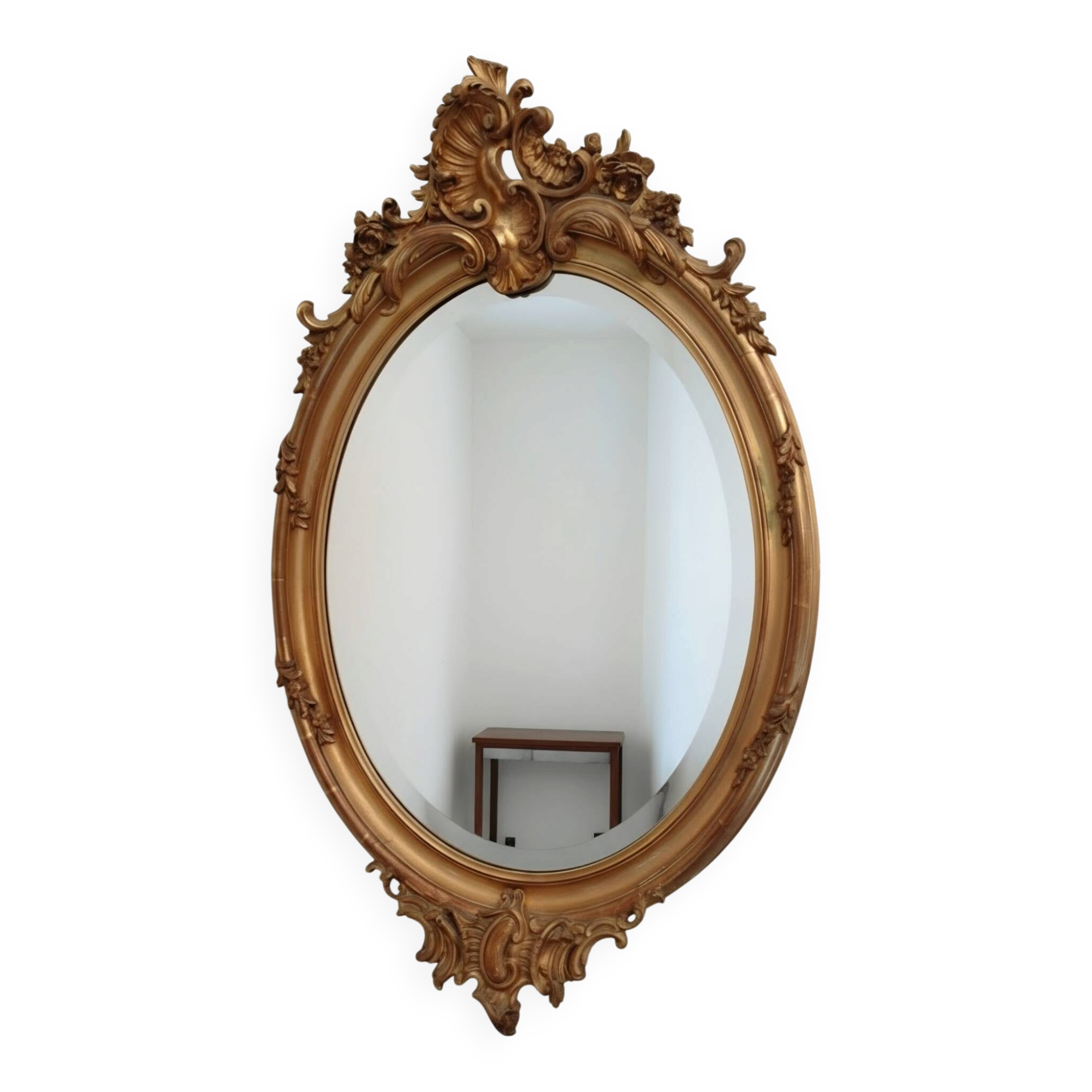 Antique oval mirror in gilded wood with gold leaf – bevelled glass –