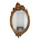 Antique oval mirror in gilded wood with gold leaf – bevelled glass –