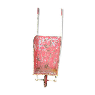 Old metal child wheelbarrow