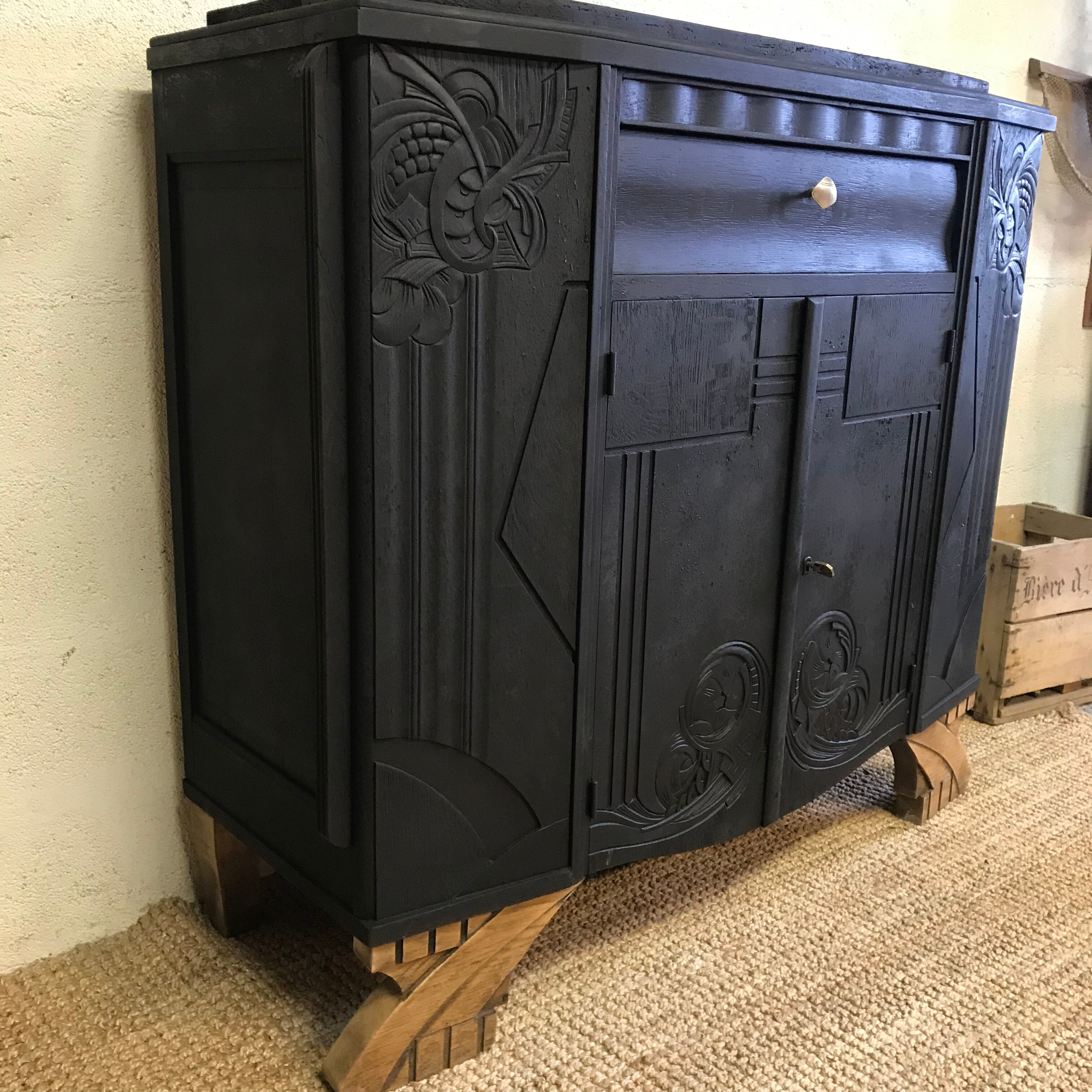 Matte black buffet and raw wood feet