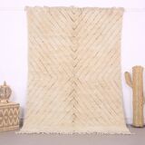 Moroccan handwoven wool rug, 250x150 cm, traditional style.