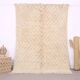 Moroccan handwoven wool rug, 250x150 cm, traditional style.