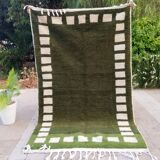 Handwoven Moroccan rug, natural wool, 250cm x 150cm, elegant decoration.